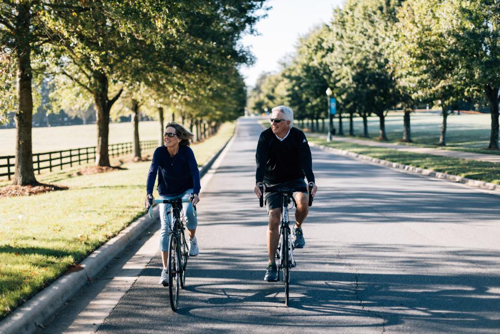 senior couple riding bikes