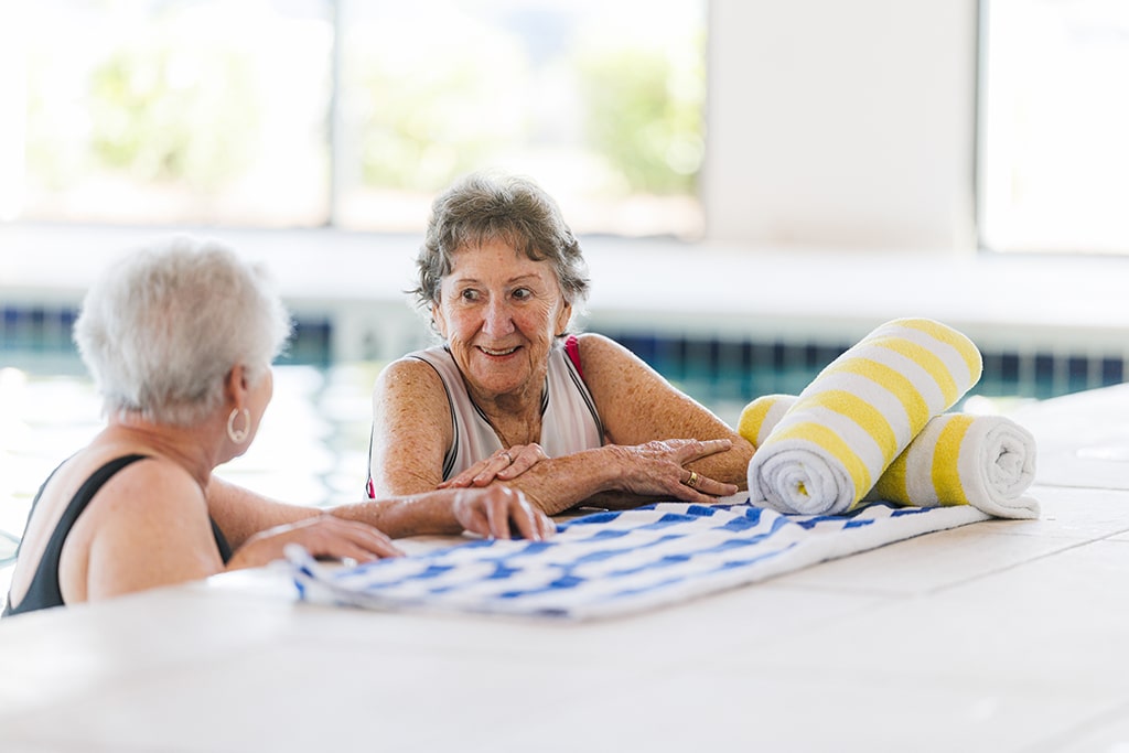 Two elderly lady's swimming together