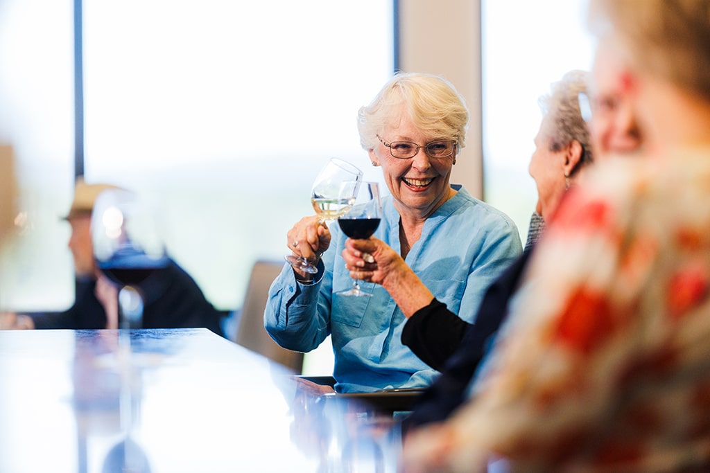 women making a wine toast